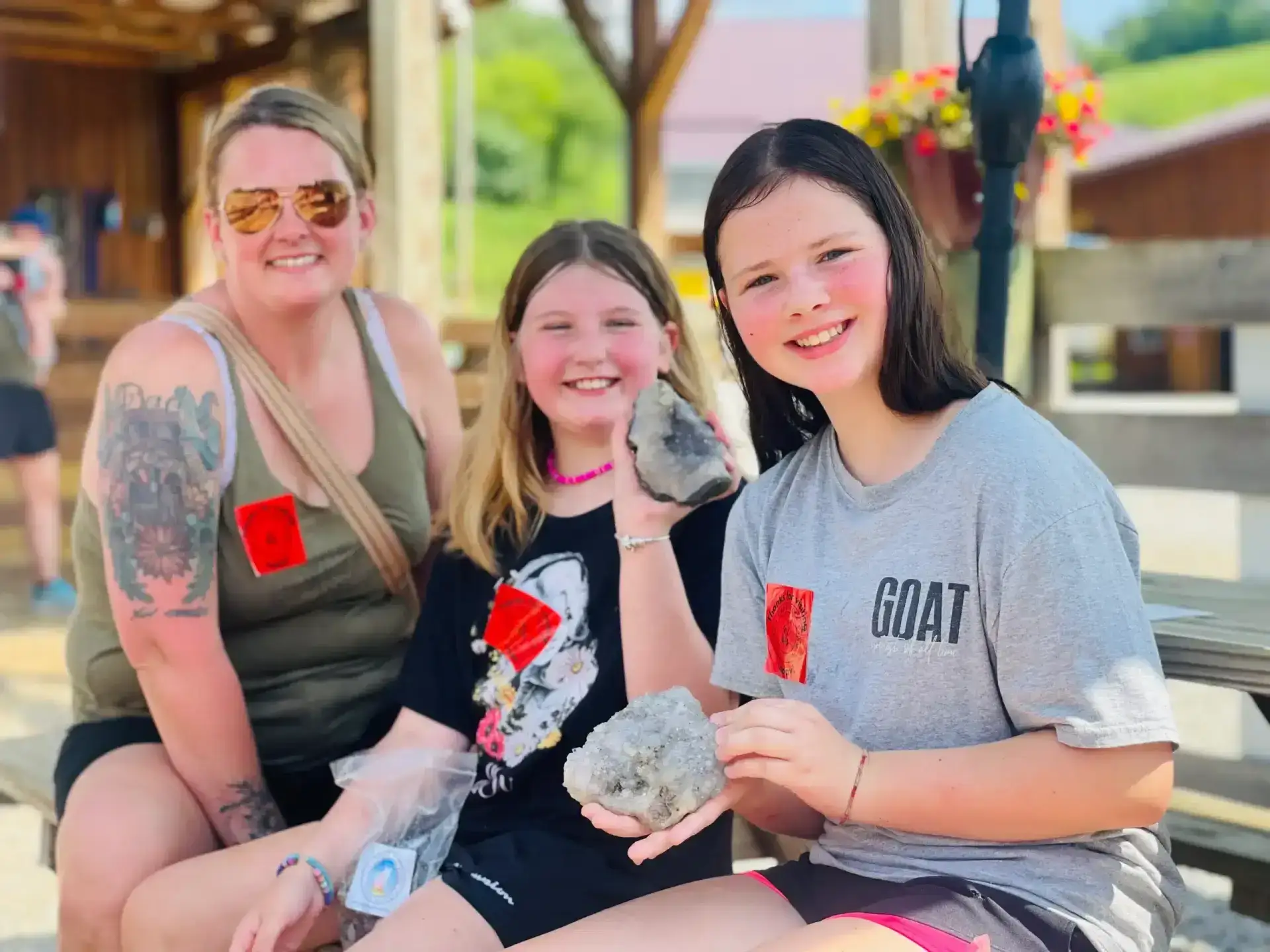 Family showing the crystal rocks they found gem mining in Ohio at Fox's High Rock Farm